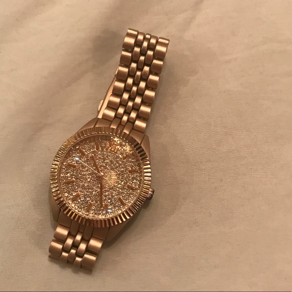 Rose gold colored watch
